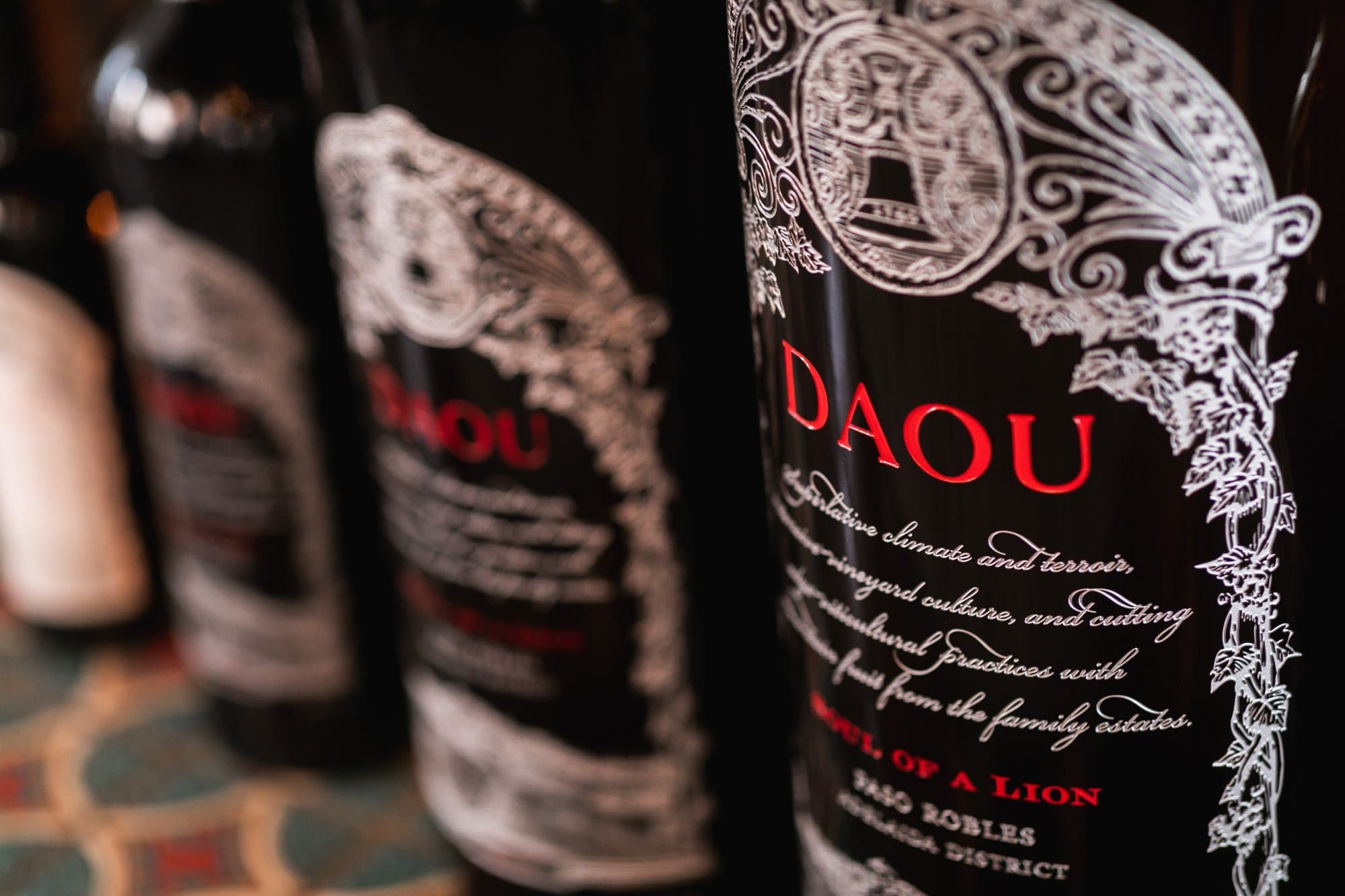 A row of large format bottles of Soul of a Lion